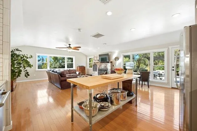 a bathroom with a sink a mirror and a shower
