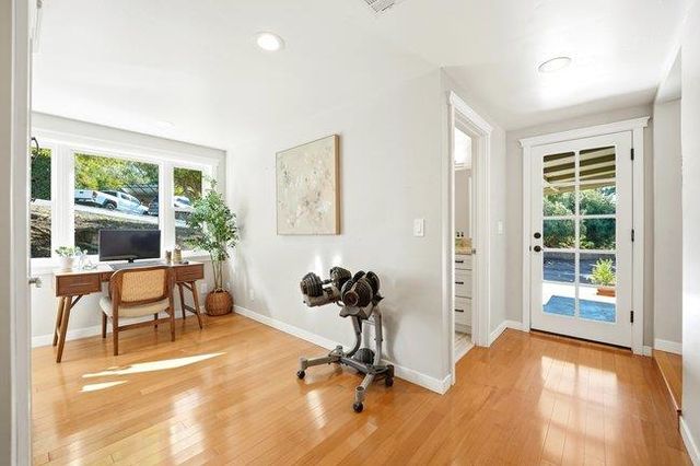 a utility room with sink dryer and washer