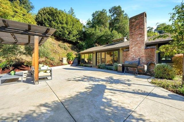 a view of a house with a patio