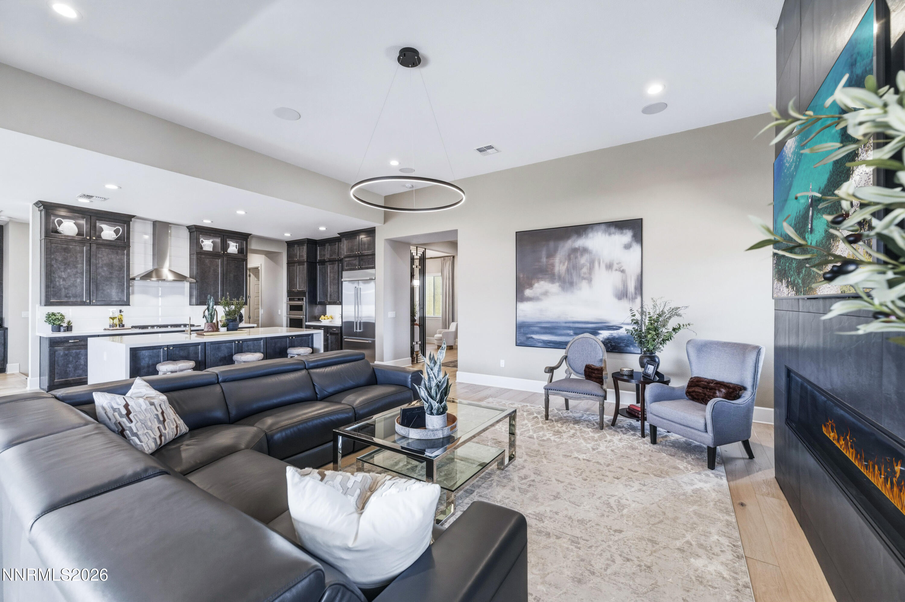 9028 Iron Sky Court Reno, NV 89523 - Photo 6 of 36 a living room with furniture and a rug