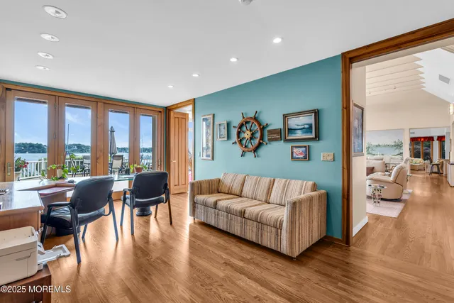 a view of a lake with a house in the background