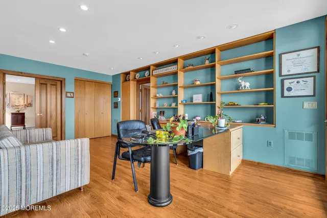 a bathroom with a granite countertop shower mirror and a sink