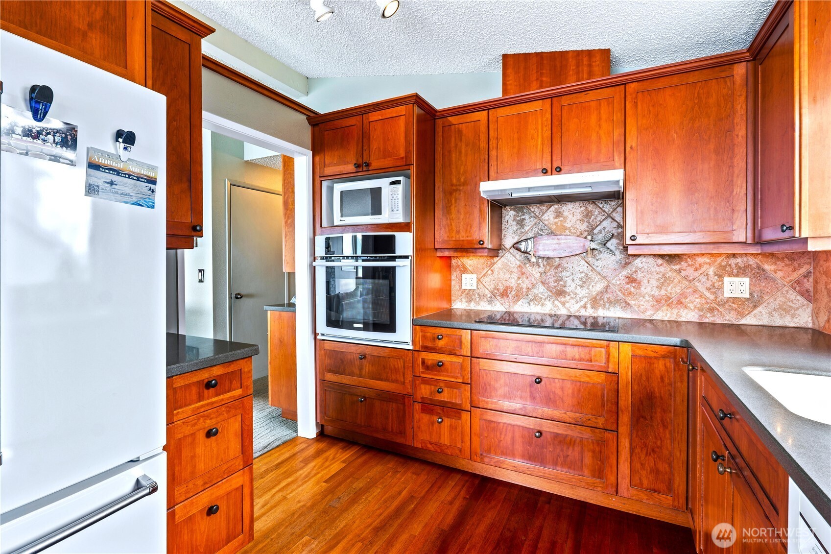 9609 Samish Island Road Bow, WA 98232 - Photo 10 of 33 a view of a kitchen with a large window