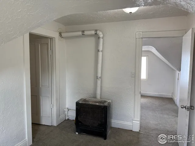 a view of a livingroom with a staircase