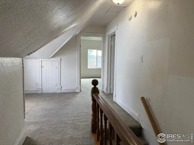 a view of a hallway with entryway