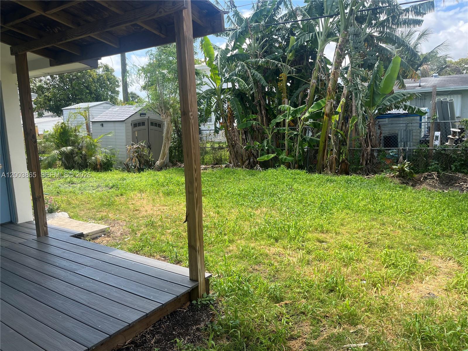 753 Southwest 3rd Street Dania Beach, FL 33004 - Photo 12 of 16 a view of a porch with furniture and garden