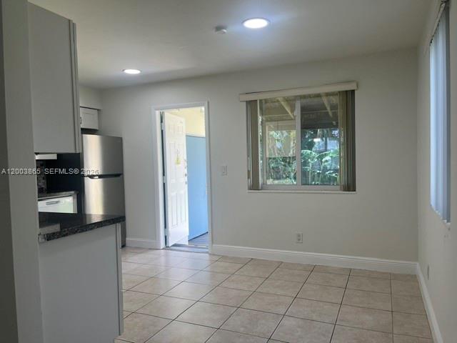 753 Southwest 3rd Street Dania Beach, FL 33004 - Photo 13 of 16 an empty room with closet and windows