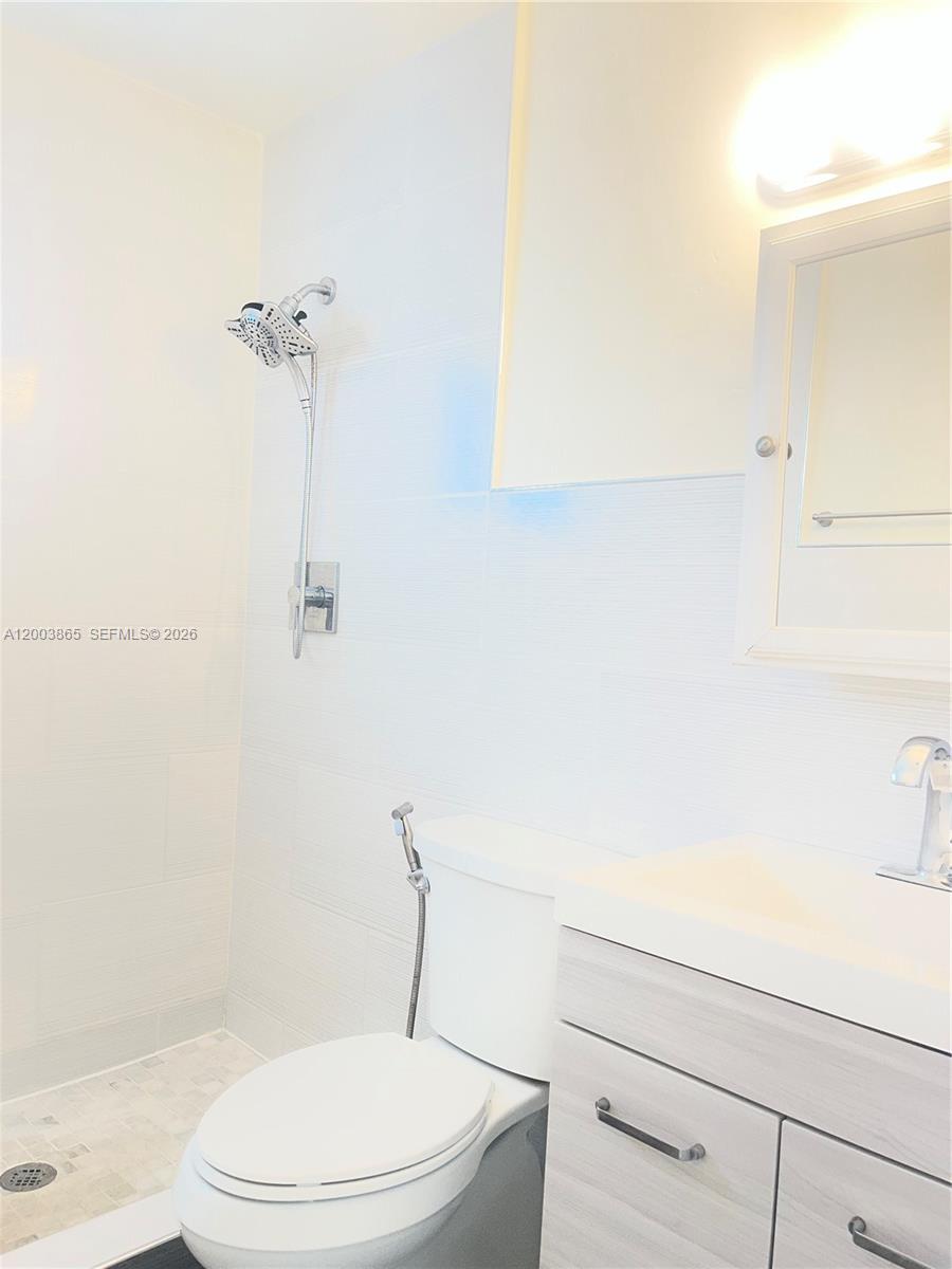 753 Southwest 3rd Street Dania Beach, FL 33004 - Photo 16 of 16 a bathroom with a toilet and a shower