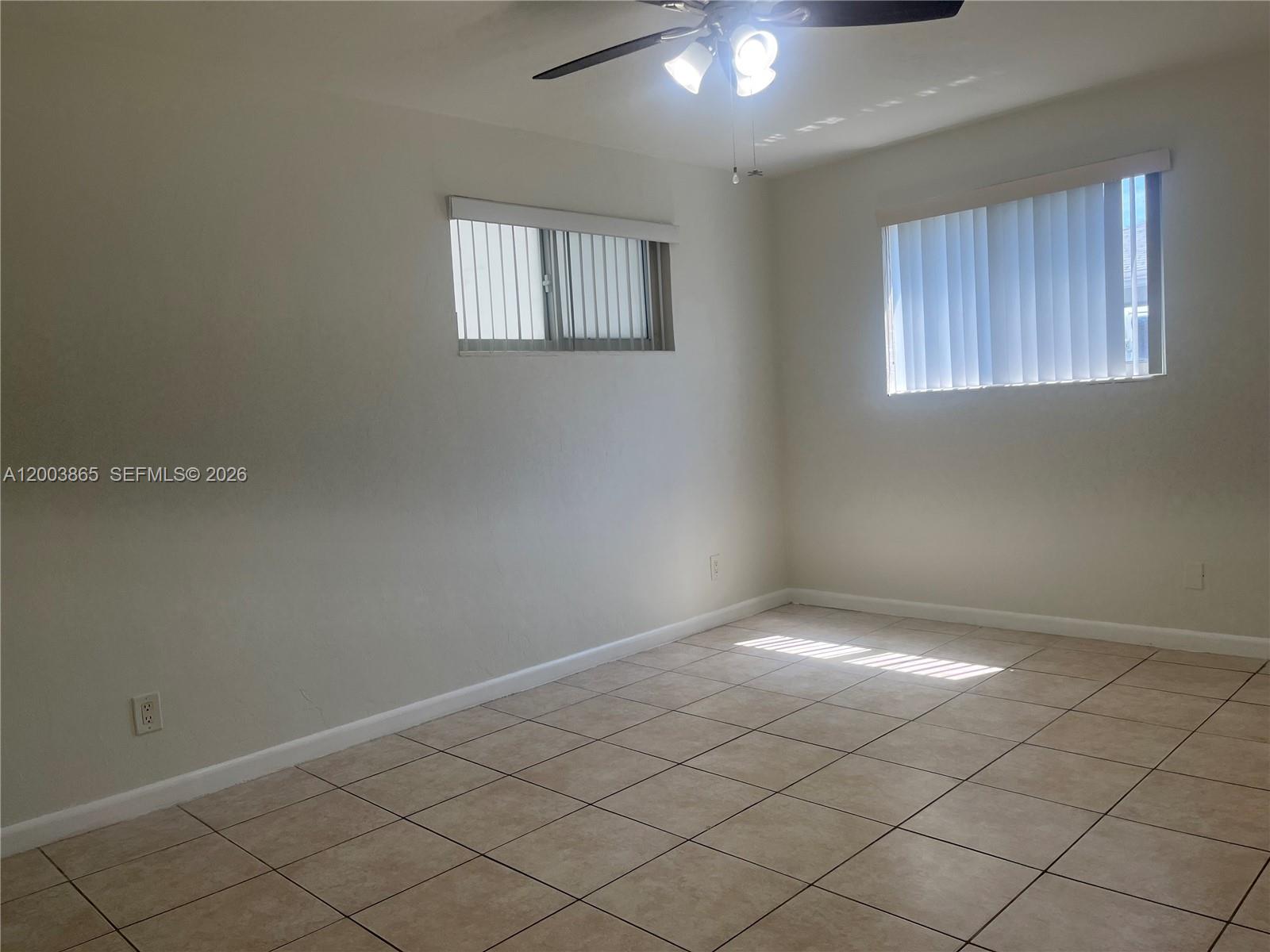 753 Southwest 3rd Street Dania Beach, FL 33004 - Photo 7 of 16 an empty room with windows