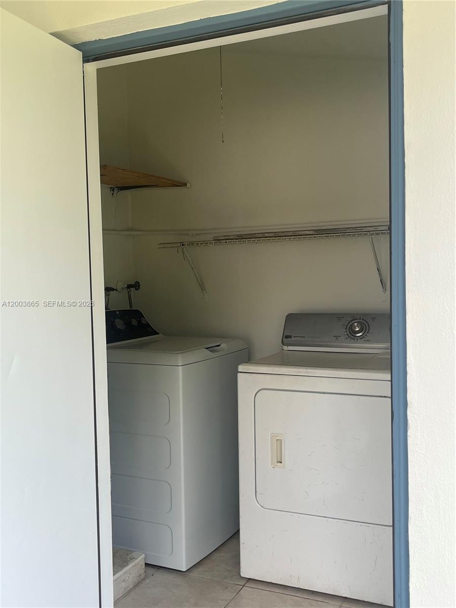 753 Southwest 3rd Street Dania Beach, FL 33004 - Photo 9 of 16 a utility room with dryer and washer