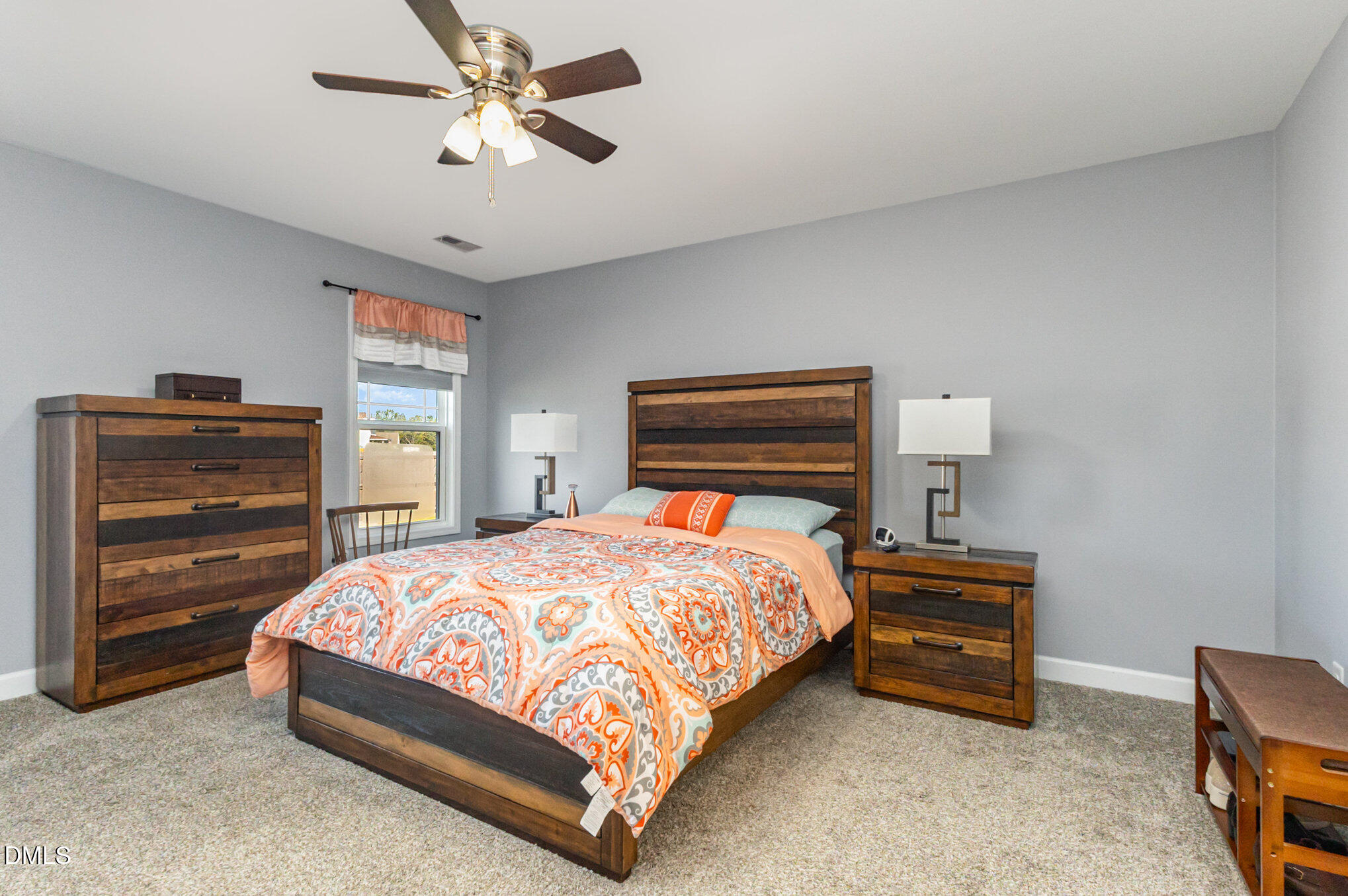 146 Wheat Drive Angier, NC 27501 - Photo 17 of 46 a bedroom with a bed and dresser