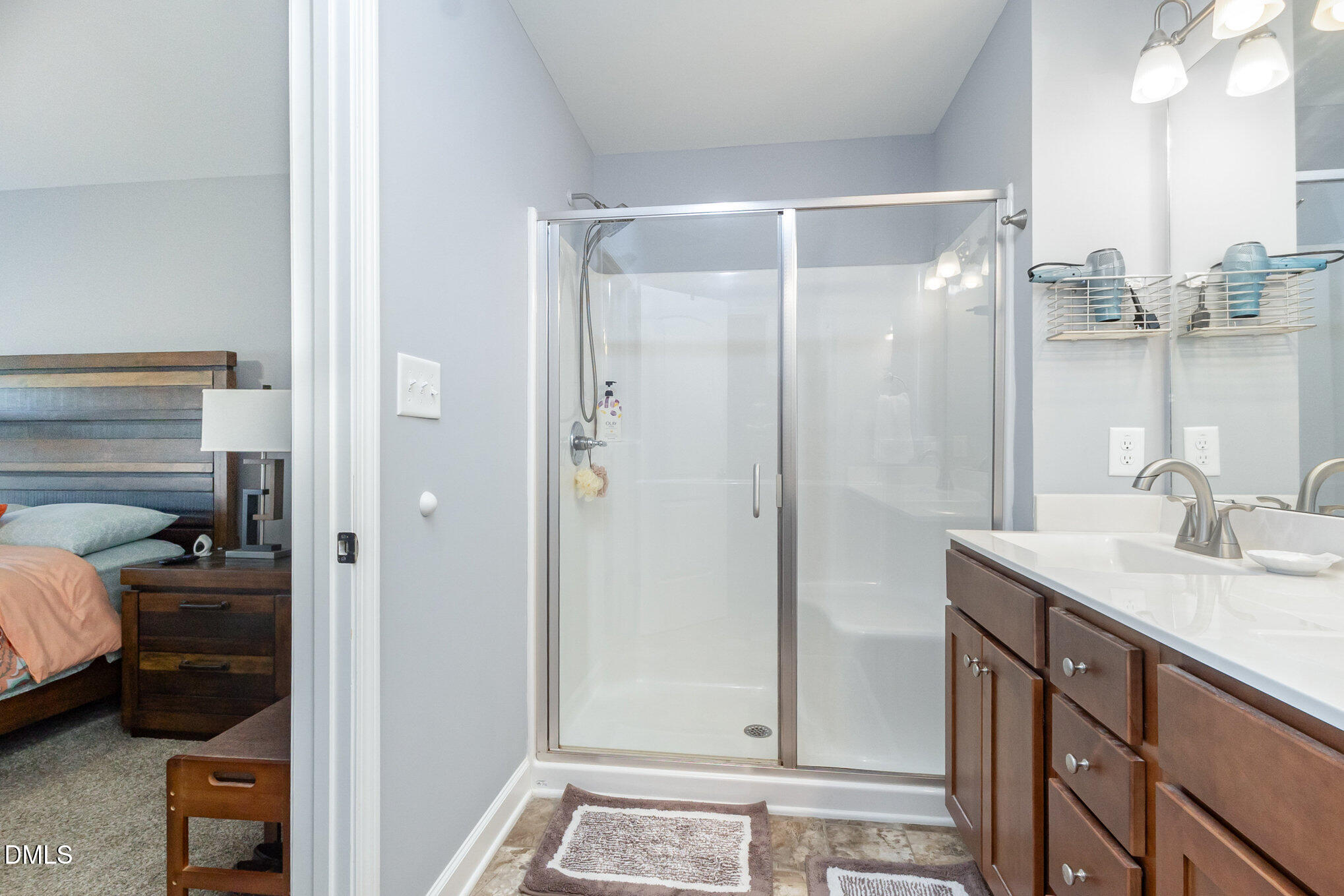 146 Wheat Drive Angier, NC 27501 - Photo 22 of 46 a bathroom with a sink and a mirror