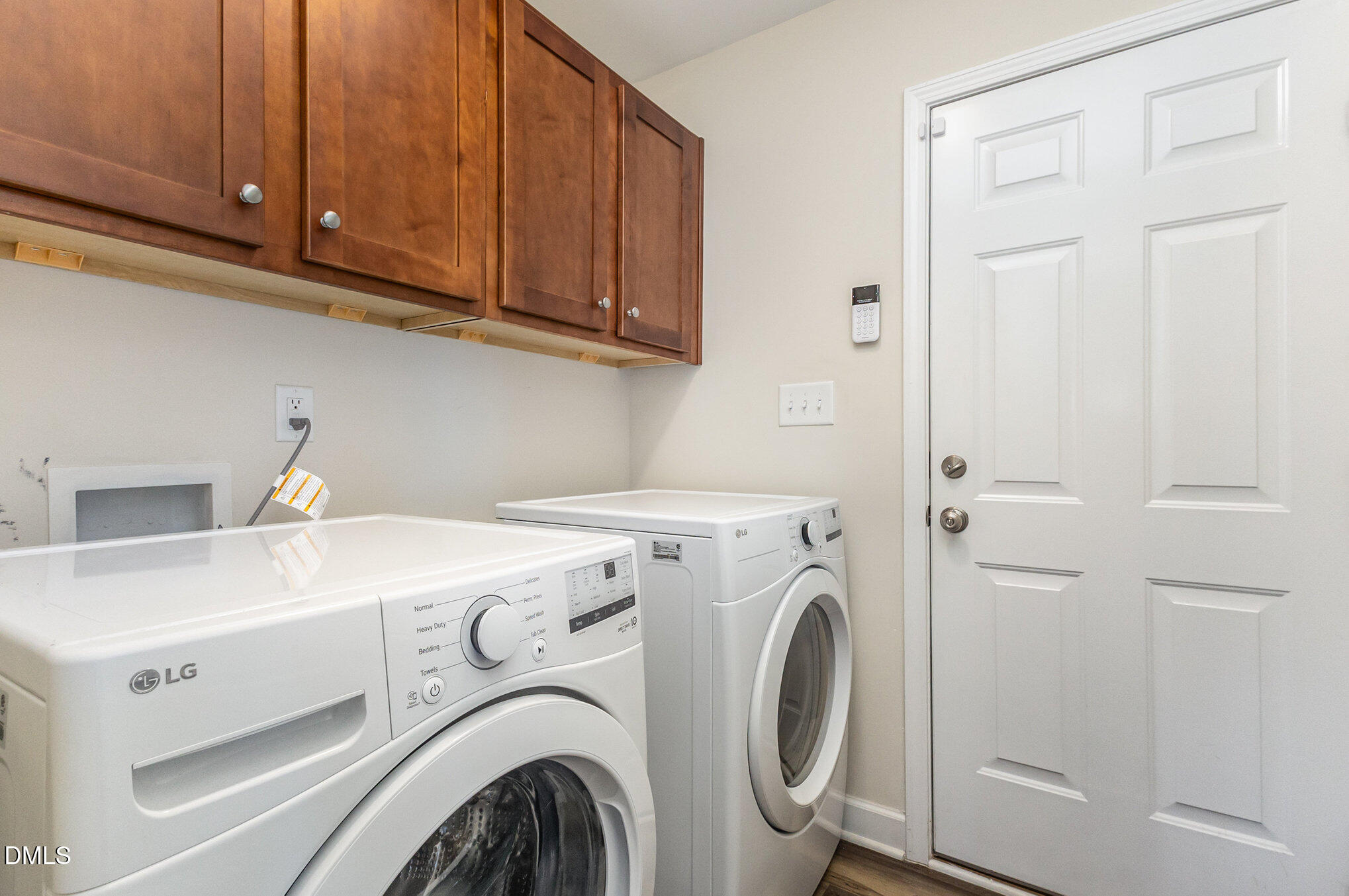 146 Wheat Drive Angier, NC 27501 - Photo 28 of 46 a utility room with dryer and washer