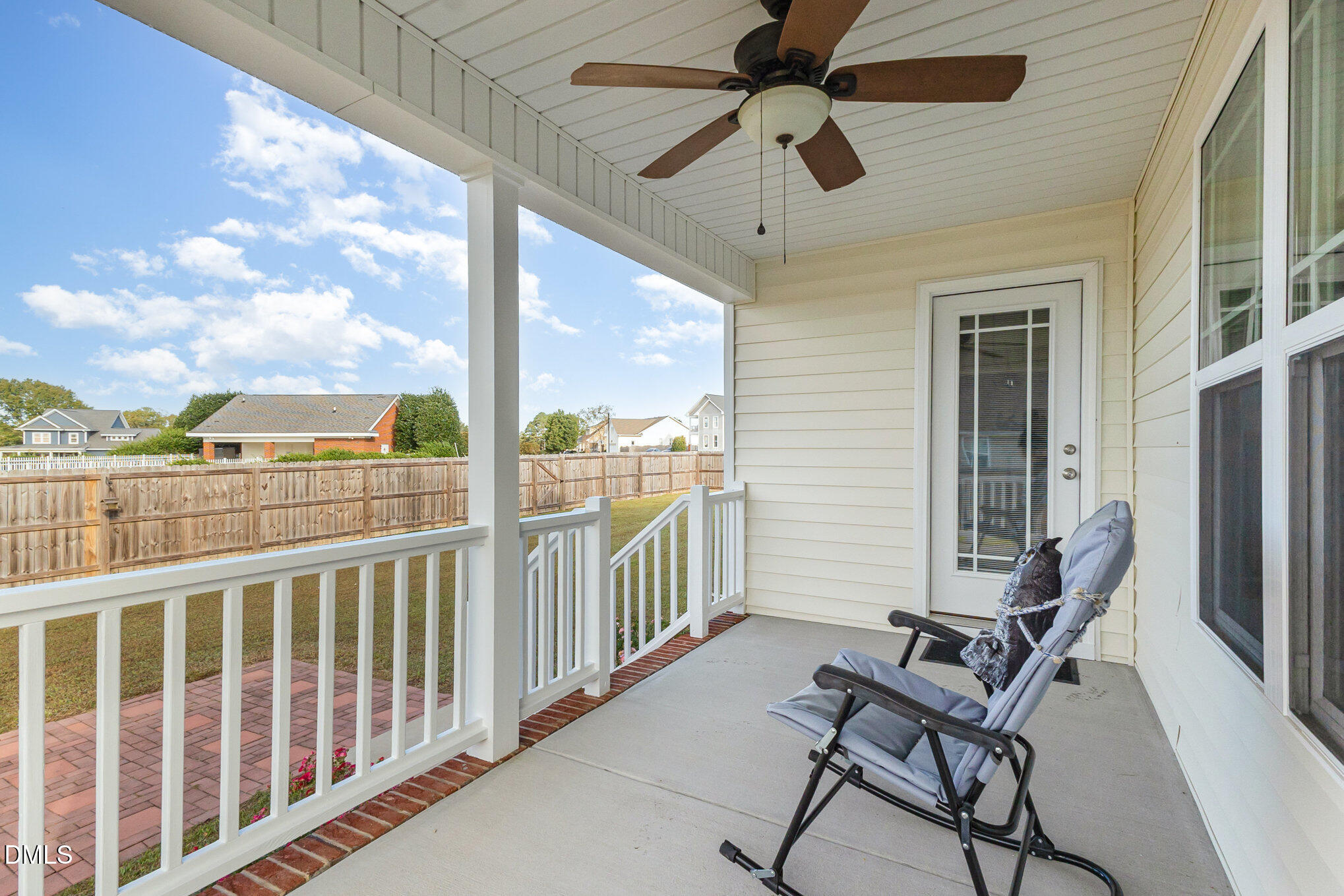146 Wheat Drive Angier, NC 27501 - Photo 31 of 46 a view of a chairs and table in a balcony