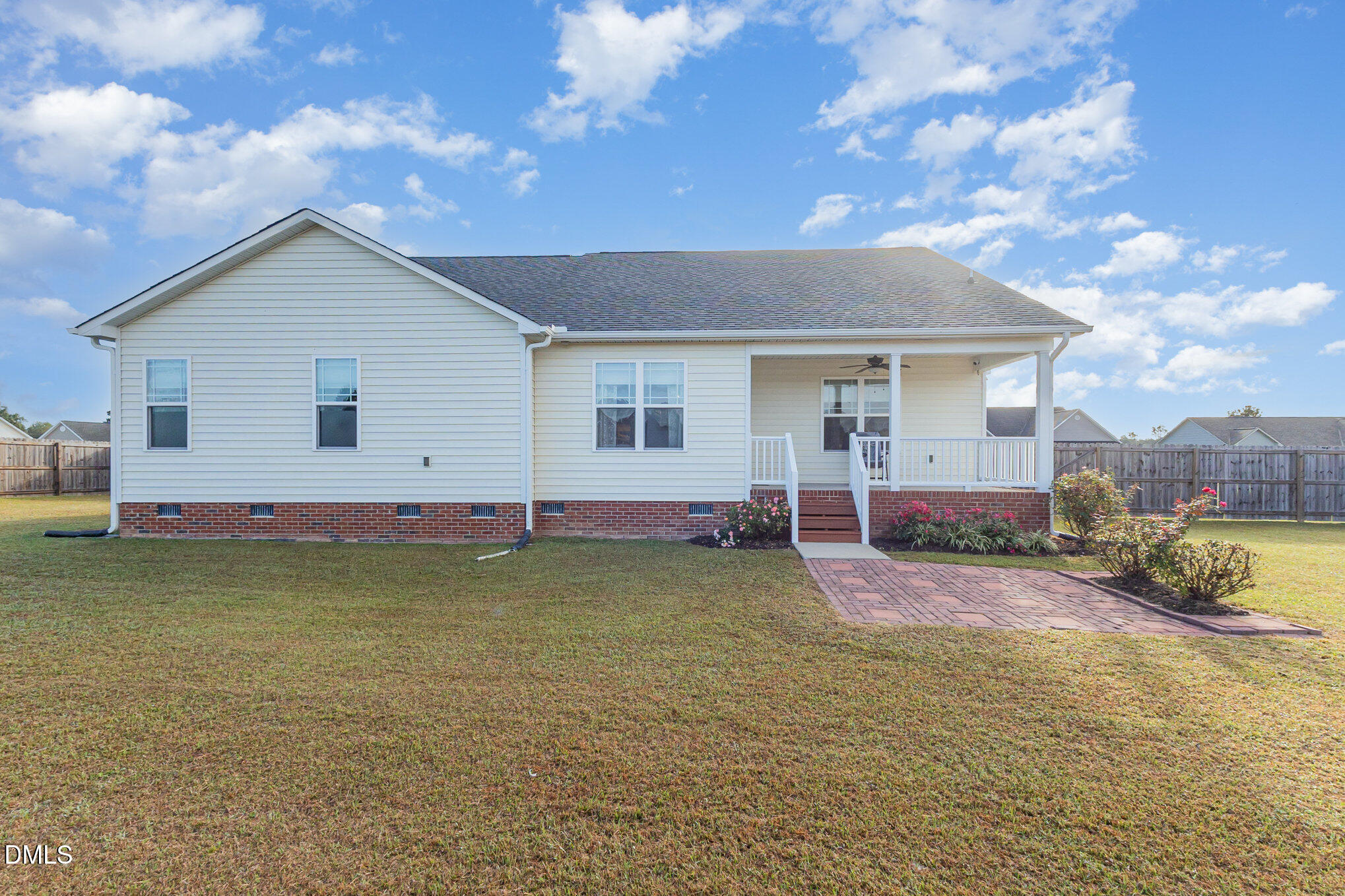 146 Wheat Drive Angier, NC 27501 - Photo 37 of 46 a view of a house with backyard and sitting area