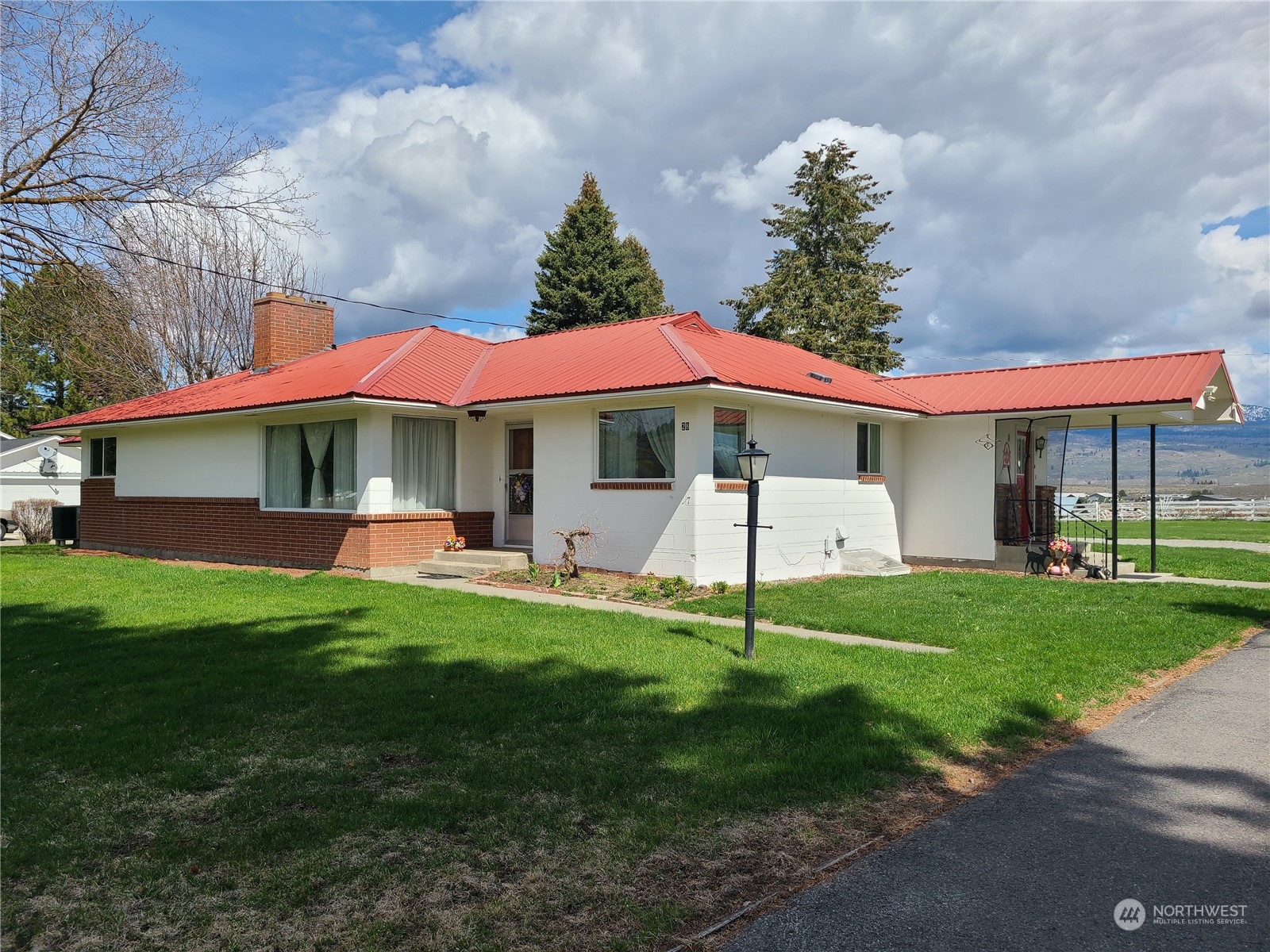 28 Robinson Canyon Road Omak, WA 98841 - Photo 1 of 33 a backyard of a house with table and chairs