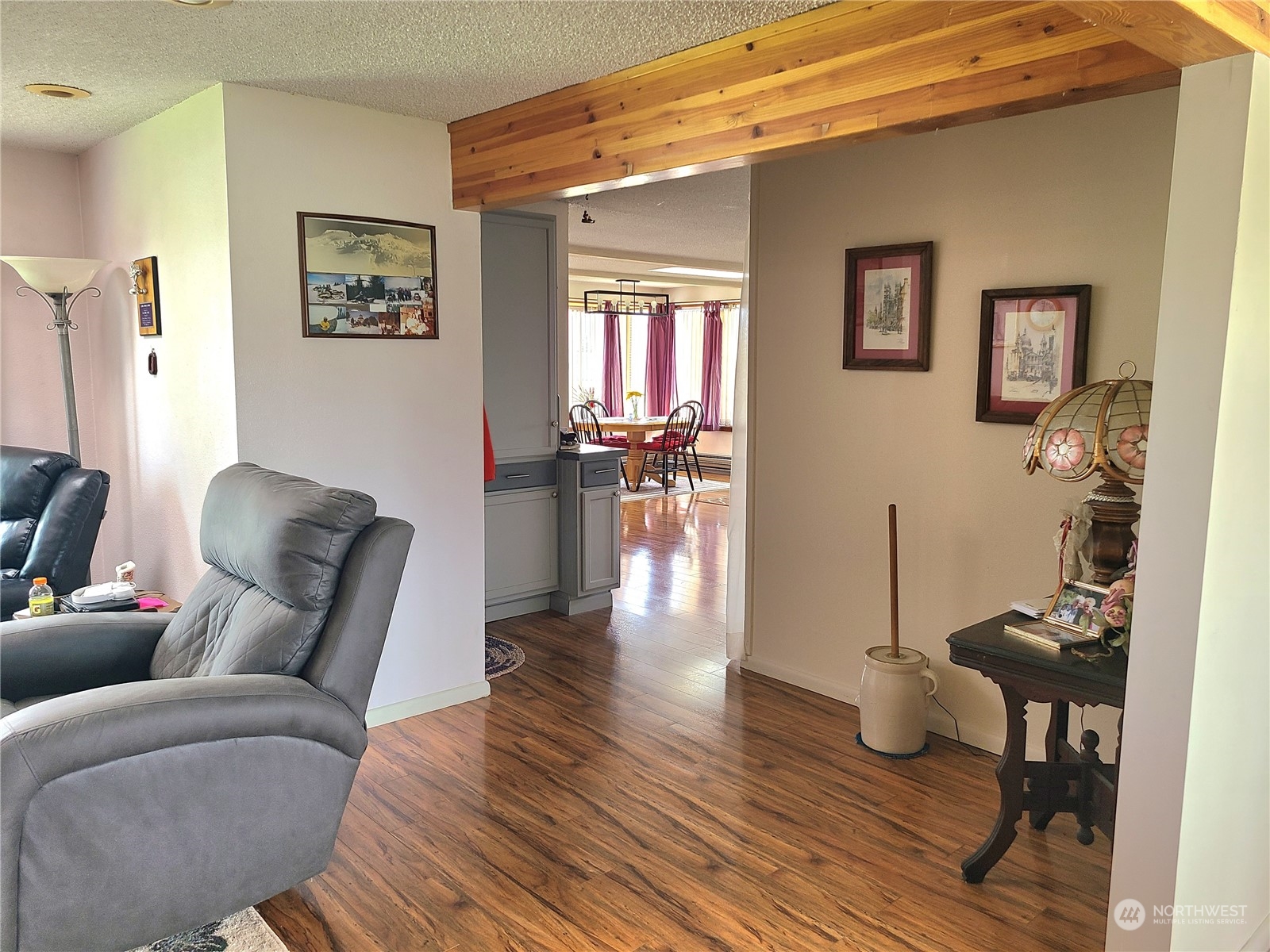 28 Robinson Canyon Road Omak, WA 98841 - Photo 18 of 33 a living room with furniture and a wooden floor