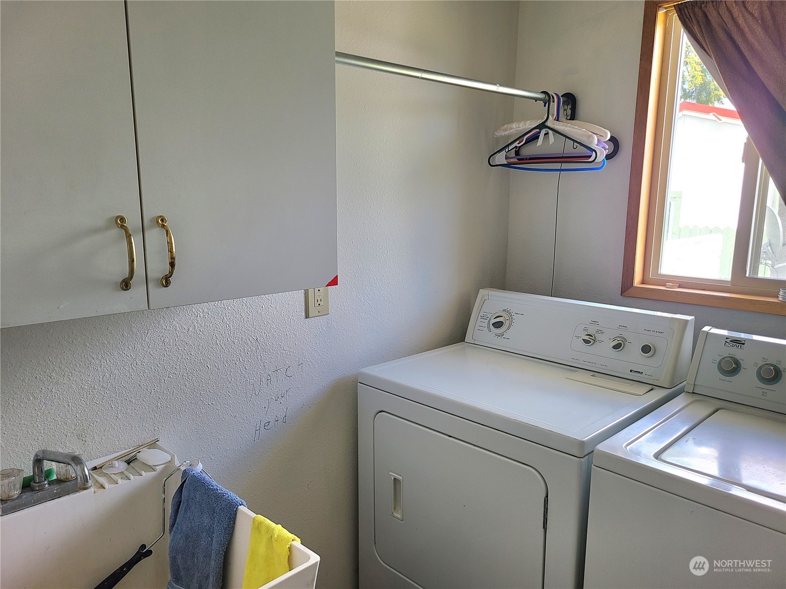 28 Robinson Canyon Road Omak, WA 98841 - Photo 24 of 33 a utility room with dryer and washer