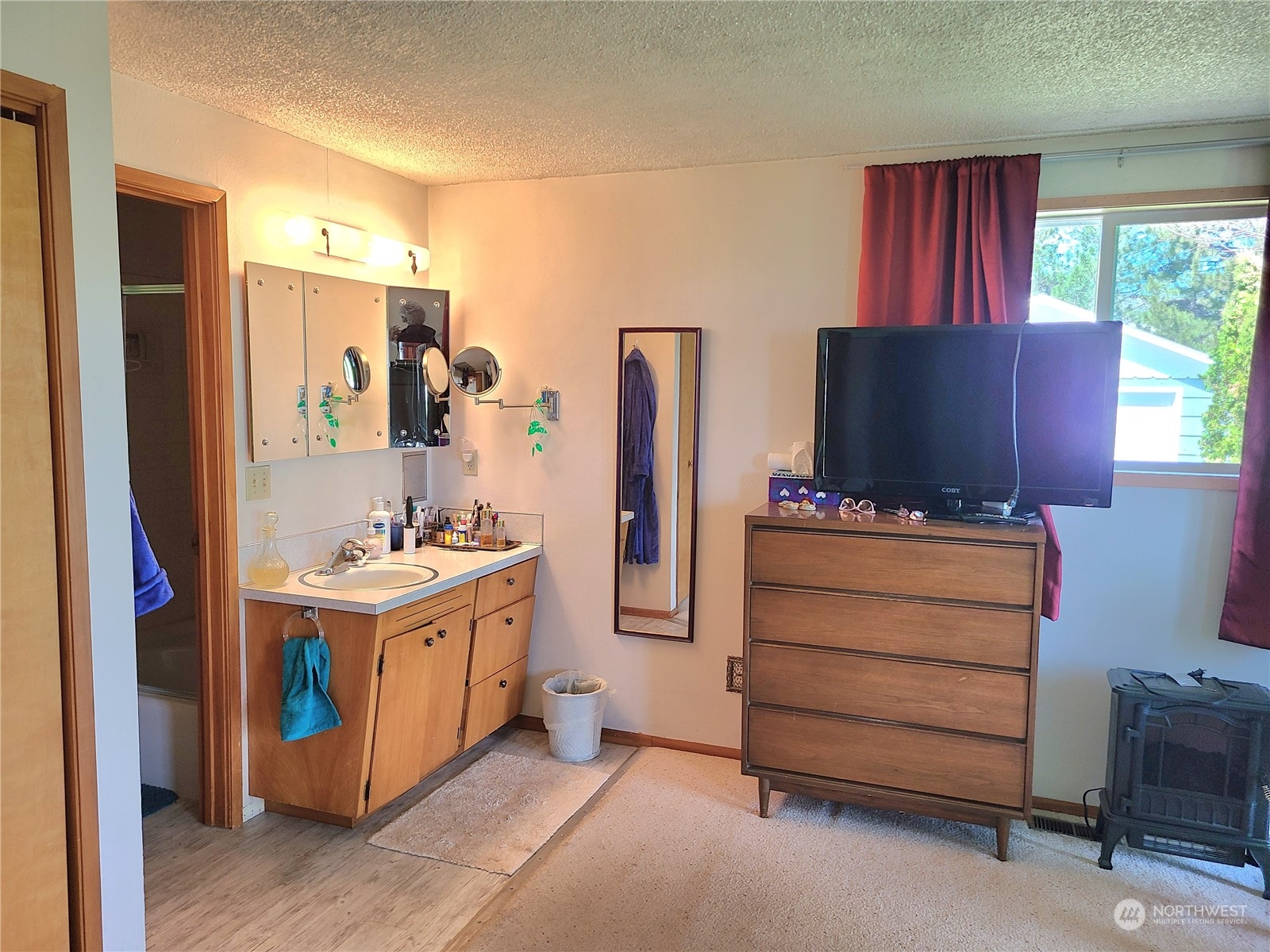 28 Robinson Canyon Road Omak, WA 98841 - Photo 28 of 33 a kitchen with stainless steel appliances granite countertop a sink and a refrigerator