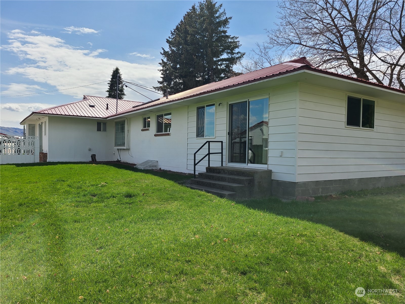 28 Robinson Canyon Road Omak, WA 98841 - Photo 7 of 33 a house view with a garden space