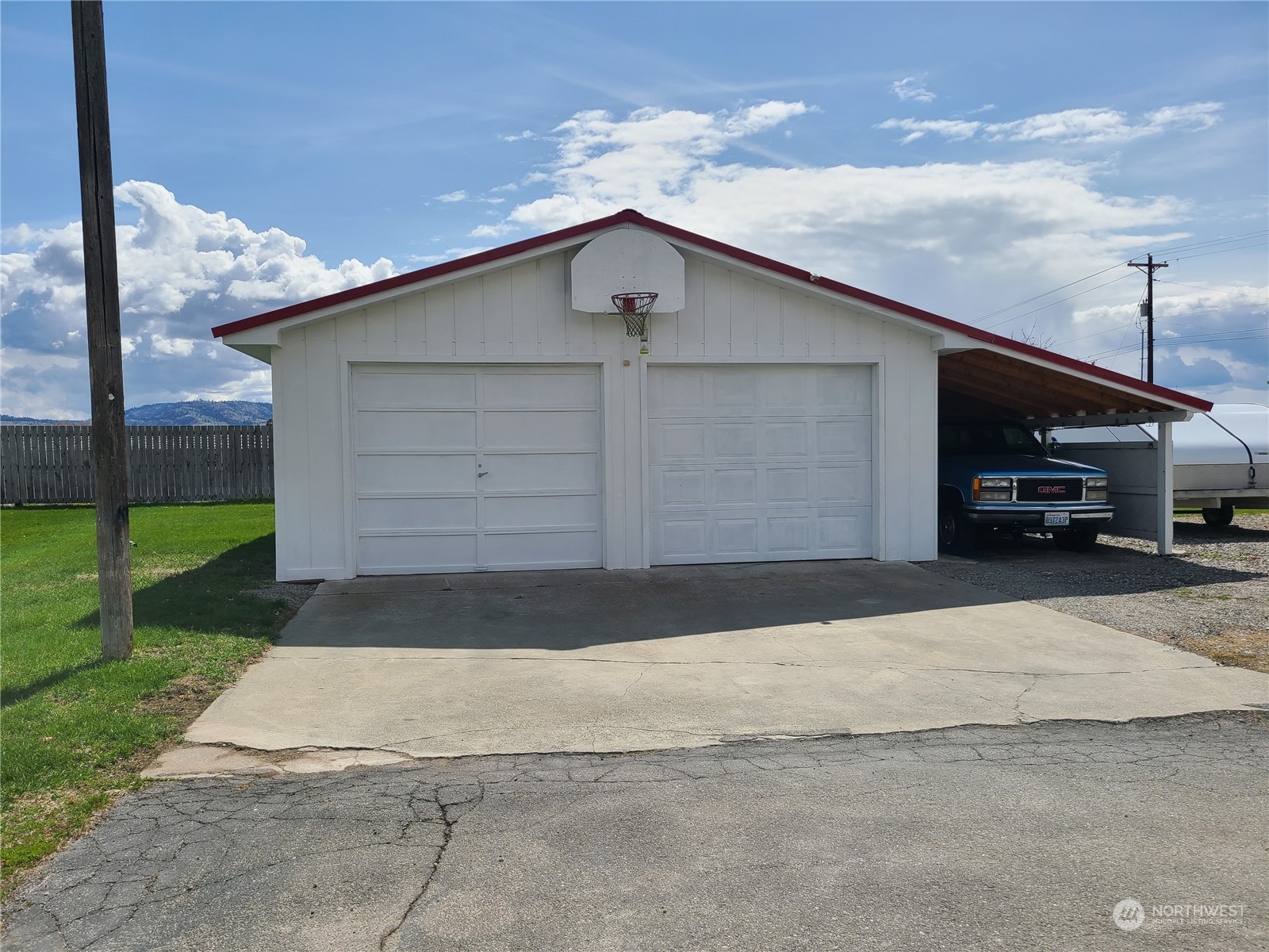 28 Robinson Canyon Road Omak, WA 98841 - Photo 9 of 33 a front view of a house with a yard and garage