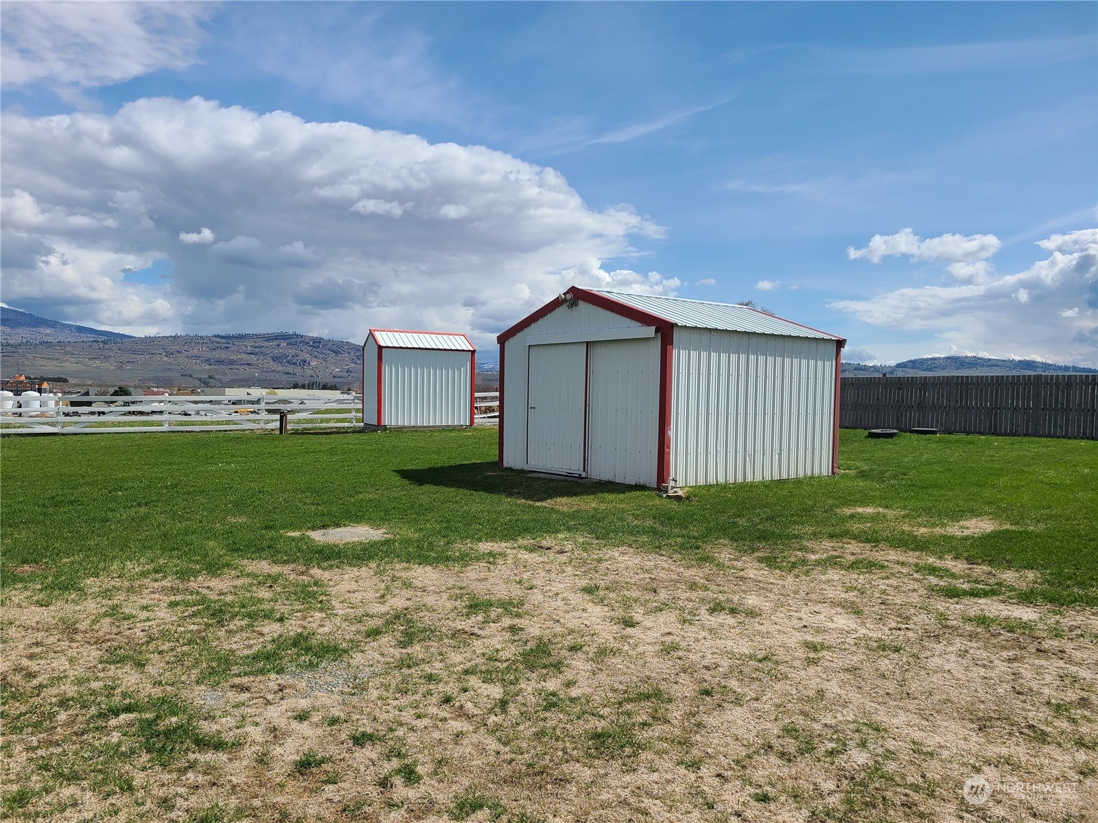 28 Robinson Canyon Road Omak, WA 98841 - Photo 10 of 33 a view of a backyard with a garden