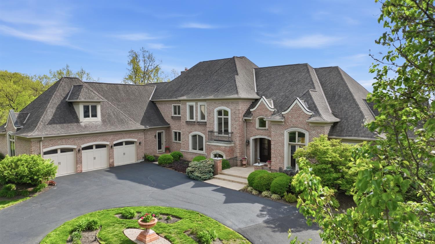 Nestled on almost 3 acres in the heart of Indian Hill, this extraordinary estate offers a rare opportunity on prestigious South Drake—one of the community’s most premier locations.