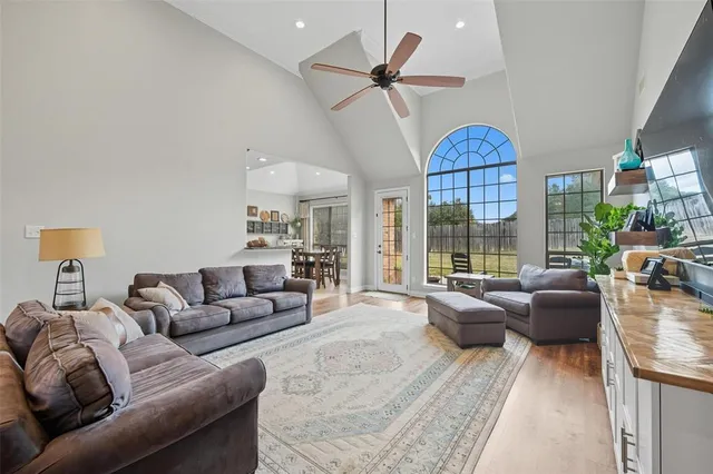 a bathroom with a sink double vanity granite and a mirror