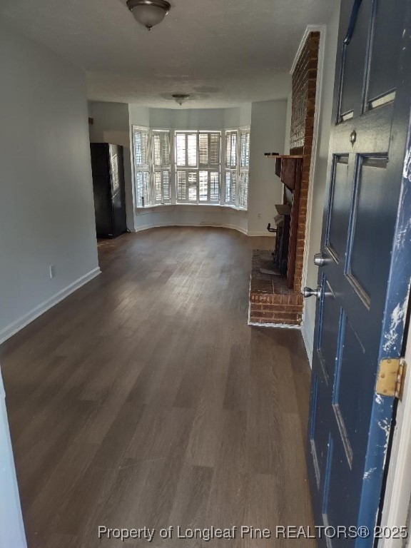 538 North Lake Road Red Springs, NC 28377 - Photo 3 of 10 wooden floor in an empty room with a window