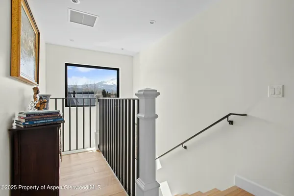 a view of a hallway with workspace