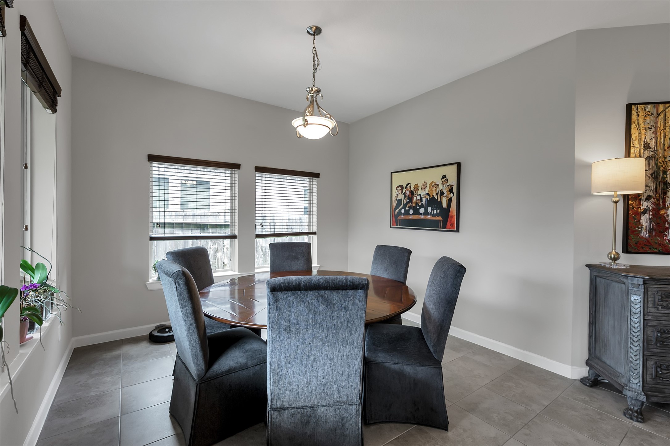 31507 Reston Cliff Court Spring, TX 77386 - Photo 12 of 31 a view of a dining room with furniture window and wooden floor