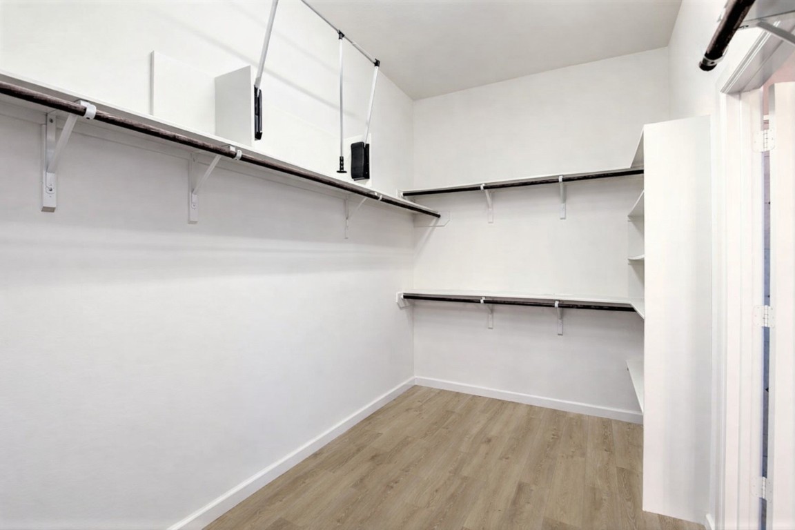 31507 Reston Cliff Court Spring, TX 77386 - Photo 17 of 30 a view of an empty walk in closet