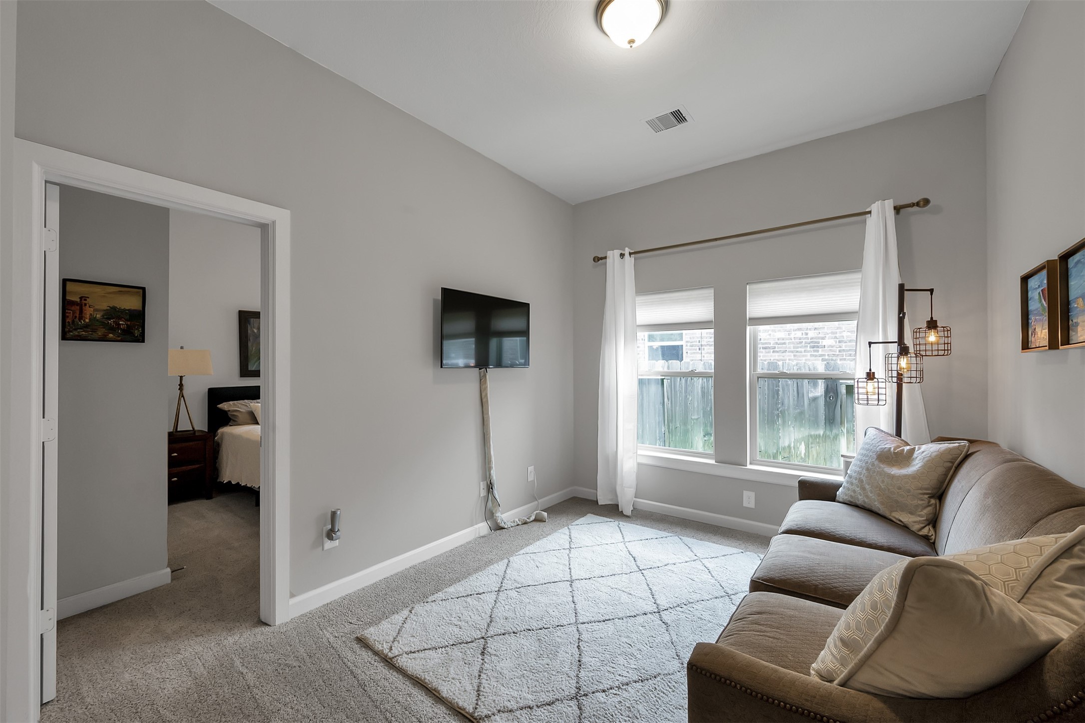 31507 Reston Cliff Court Spring, TX 77386 - Photo 19 of 31 a living room with furniture and a large window