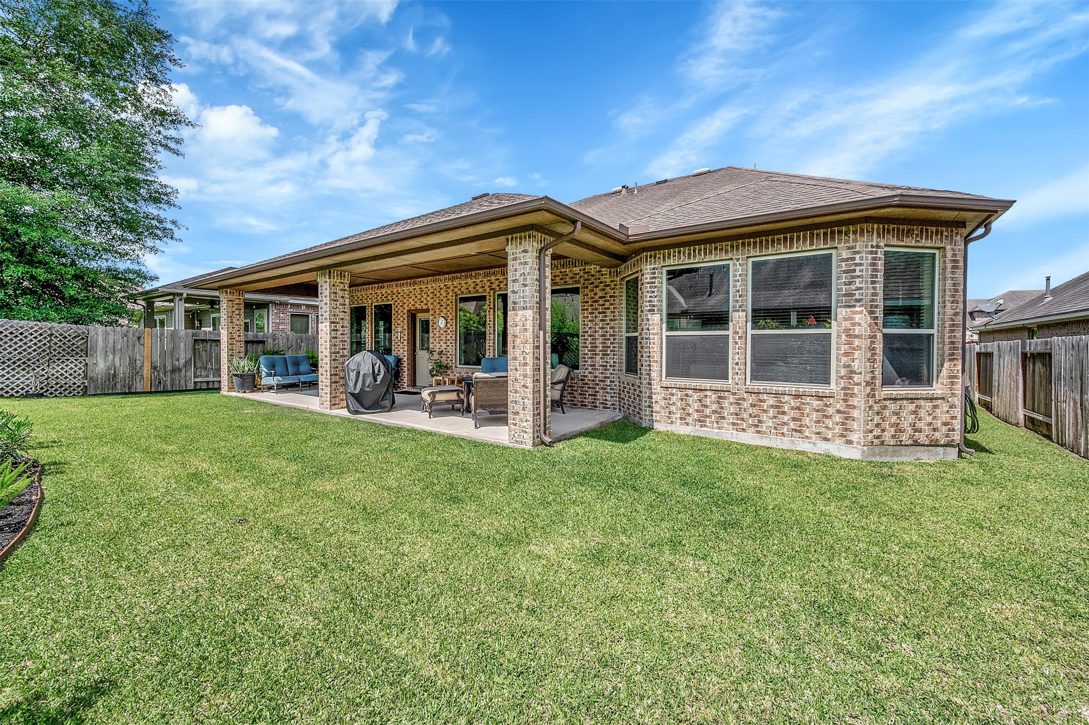 31507 Reston Cliff Court Spring, TX 77386 - Photo 20 of 30 a view of a house with a backyard