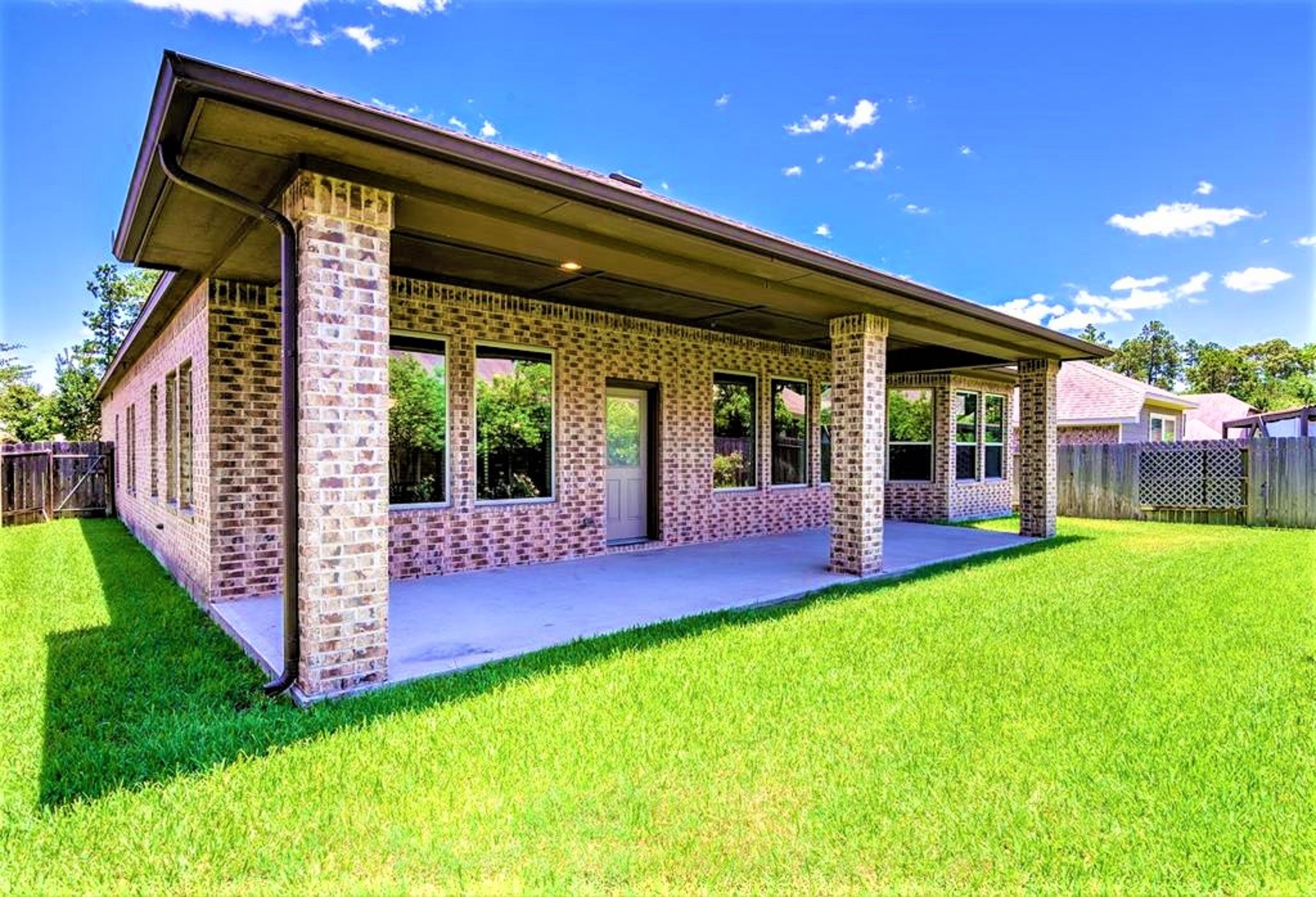 31507 Reston Cliff Court Spring, TX 77386 - Photo 21 of 30 a front view of a house with a yard