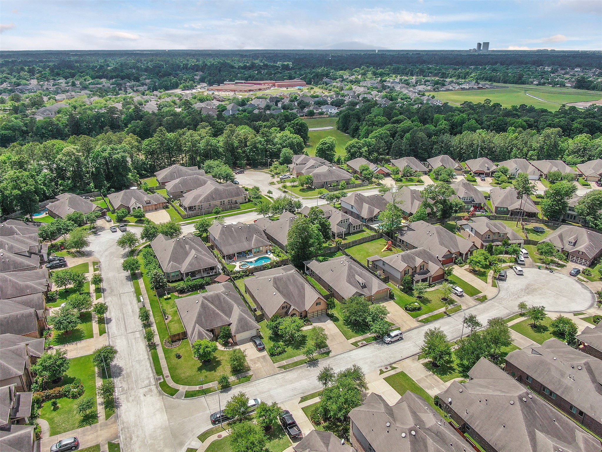 31507 Reston Cliff Court Spring, TX 77386 - Photo 22 of 30 an aerial view of a city with lots of residential buildings