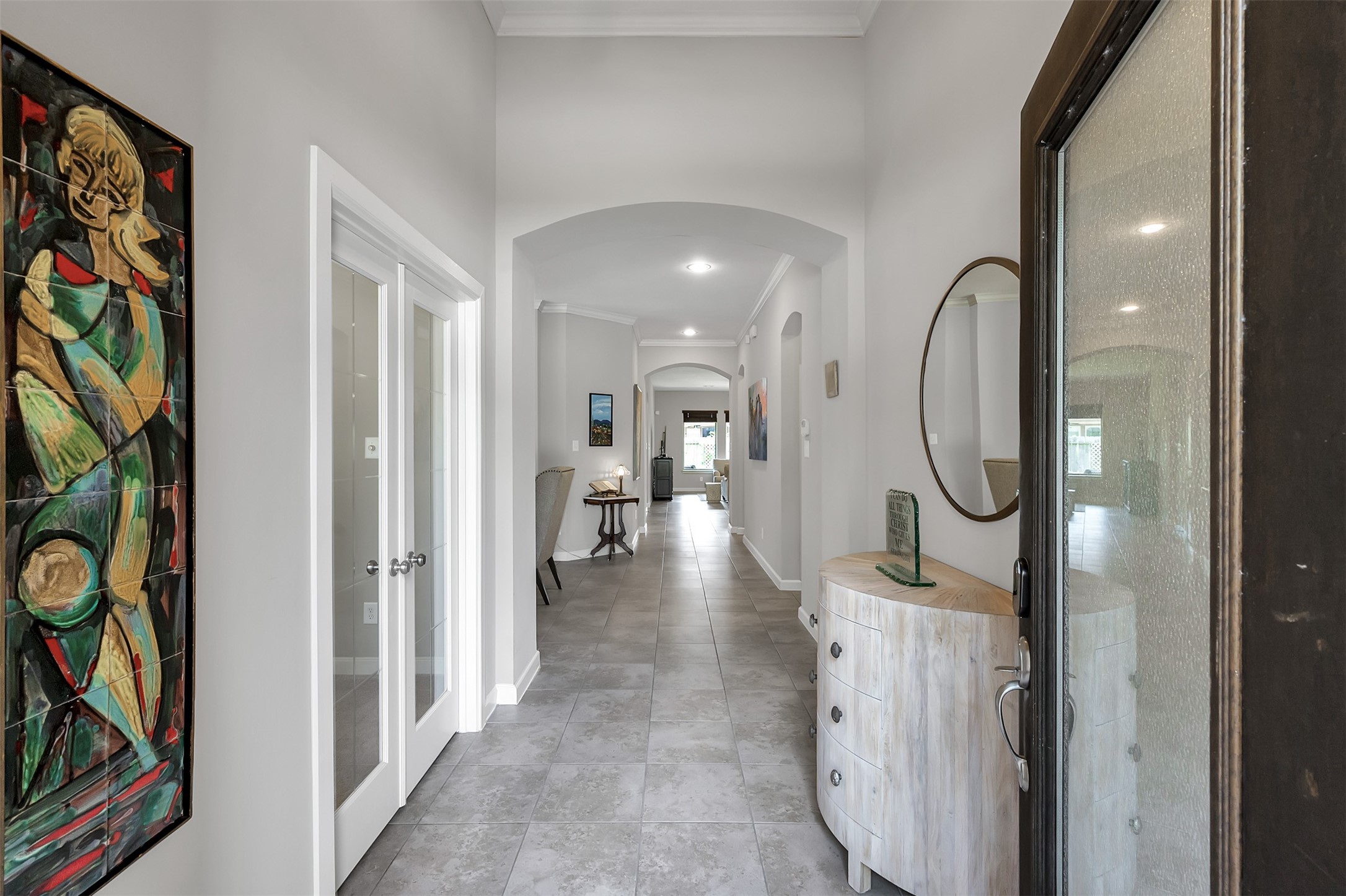 31507 Reston Cliff Court Spring, TX 77386 - Photo 4 of 31 a view of a hallway with wooden floor and staircase