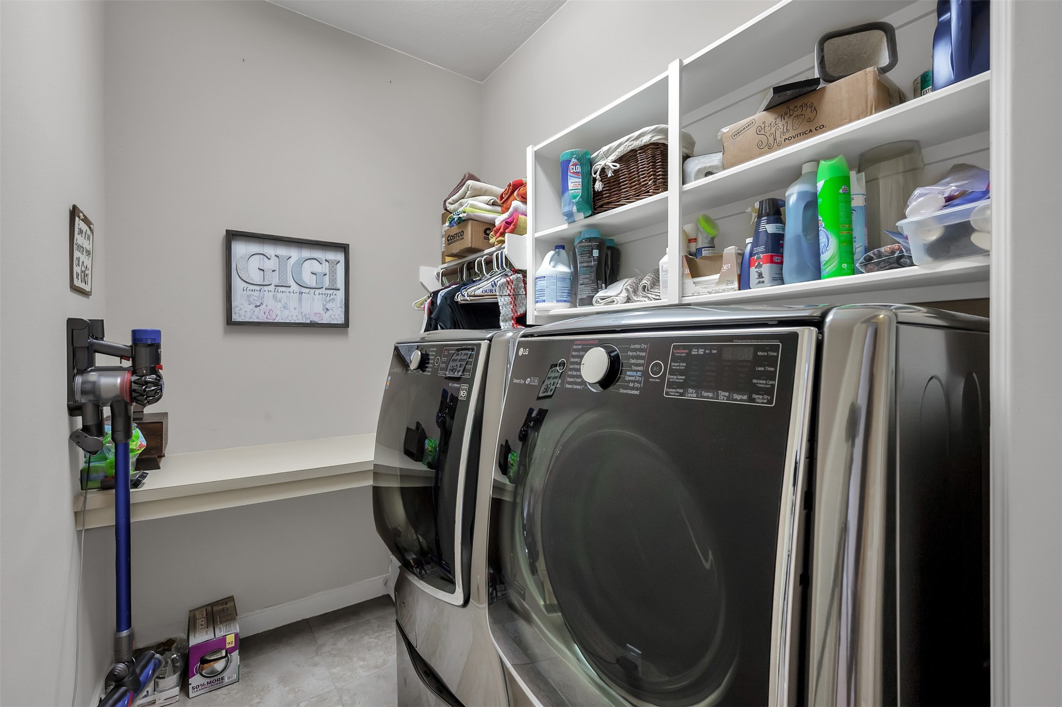 31507 Reston Cliff Court Spring, TX 77386 - Photo 7 of 31 a utility room with dryer and washer