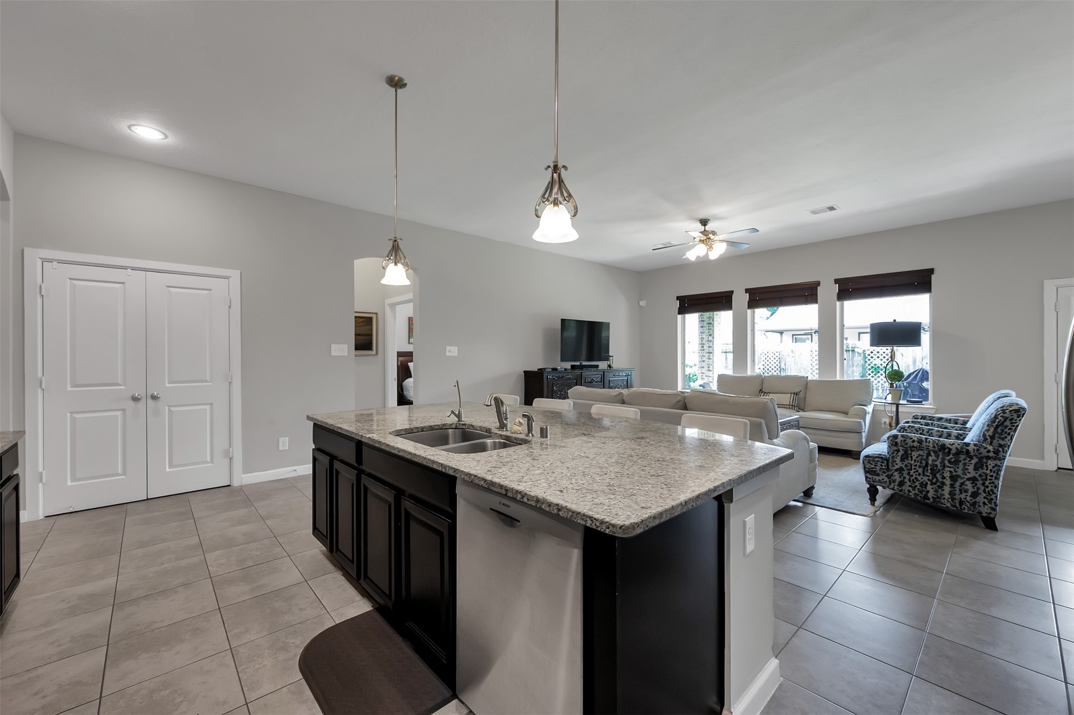 31507 Reston Cliff Court Spring, TX 77386 - Photo 9 of 31 a kitchen with a counter space dining table and chairs