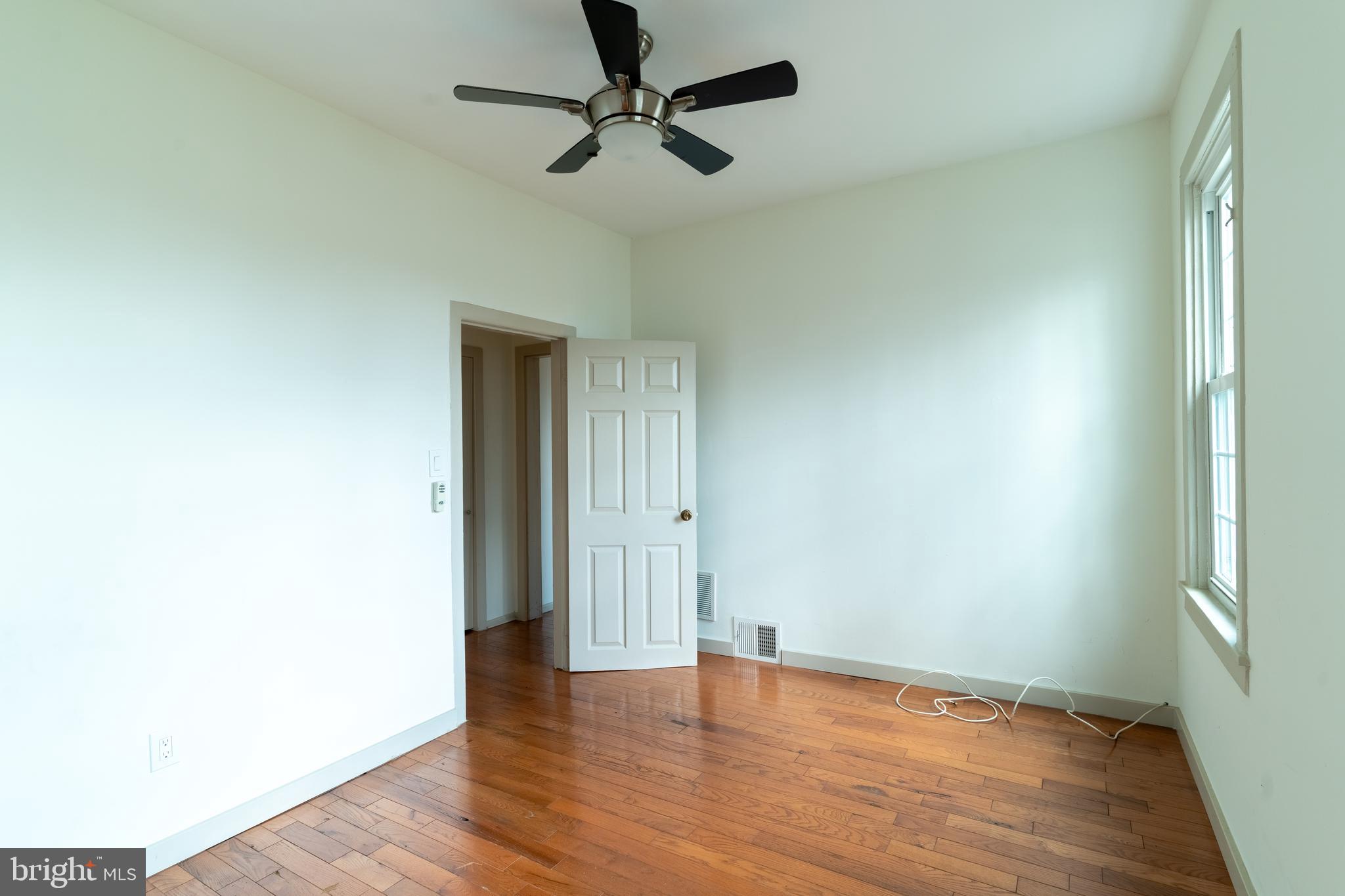 100 Potter Street, Unit 4 Haddonfield, NJ 08033 - Photo 12 of 17 wooden floor in an empty room