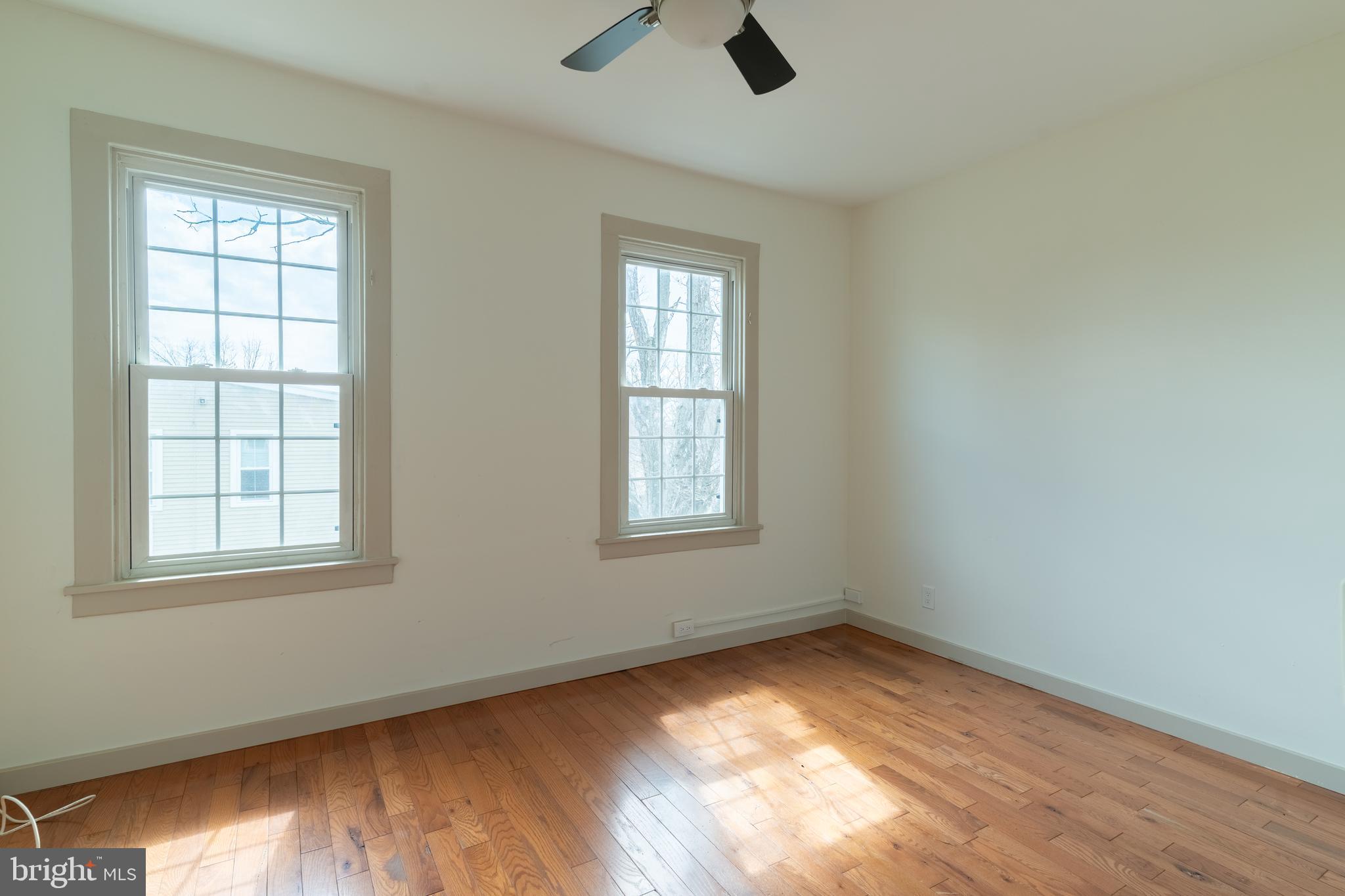 100 Potter Street, Unit 4 Haddonfield, NJ 08033 - Photo 13 of 17 an empty room with windows and closet
