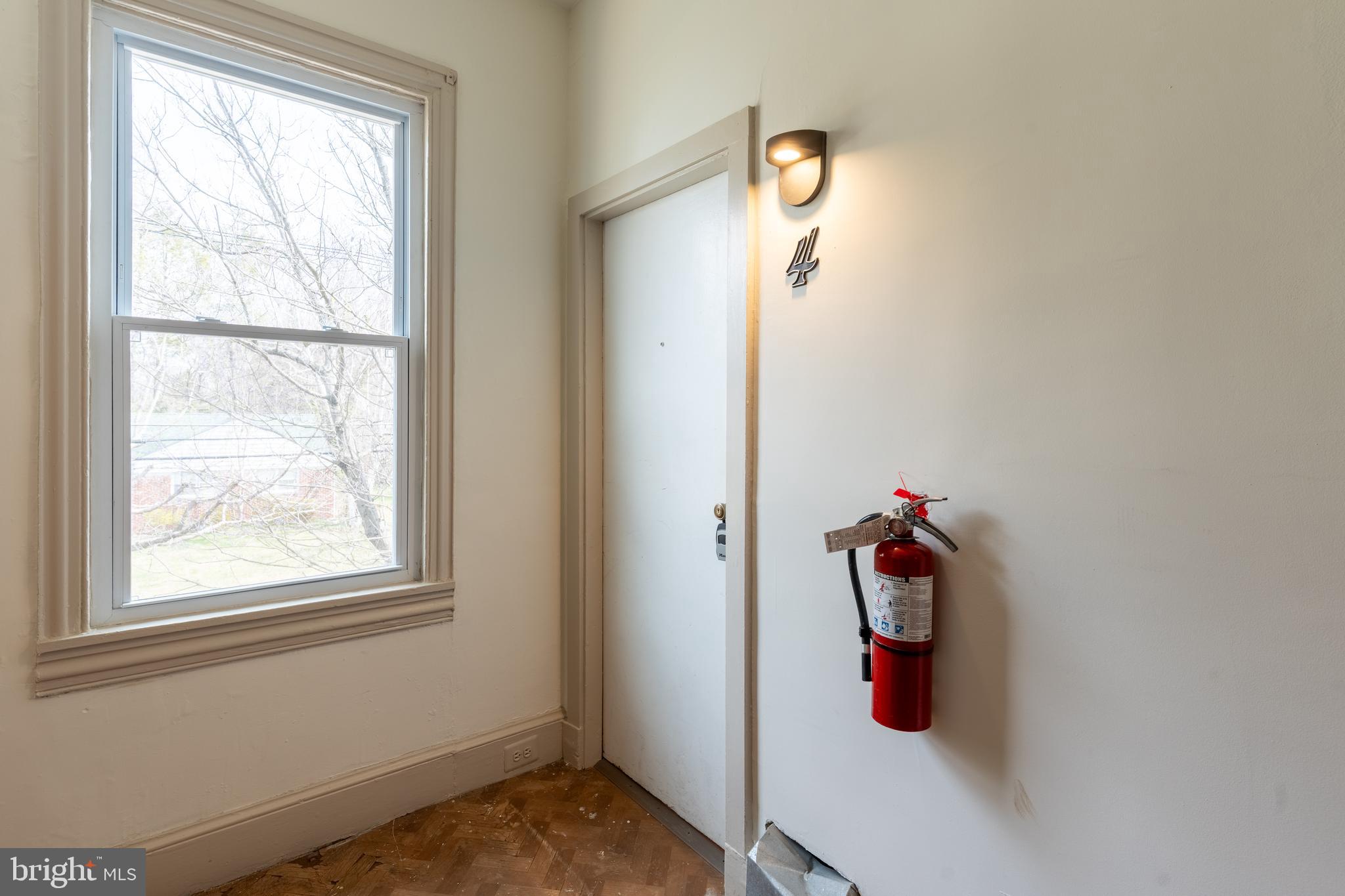 100 Potter Street, Unit 4 Haddonfield, NJ 08033 - Photo 17 of 17 a view of a room with rack and windows