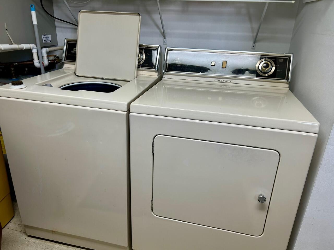 1 Southeast Turtle Creek Drive, Unit B Jupiter, FL 33469 - Photo 23 of 31 a close up view of washer and dryer with washer
