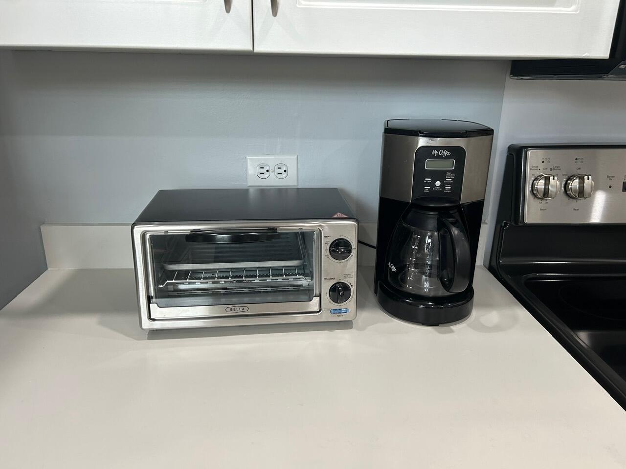 1 Southeast Turtle Creek Drive, Unit B Jupiter, FL 33469 - Photo 7 of 31 a utility room with dryer and washer