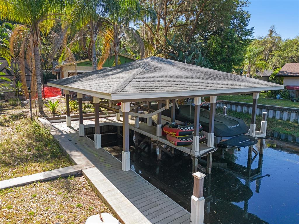 Steps from your yard is your private boathouse