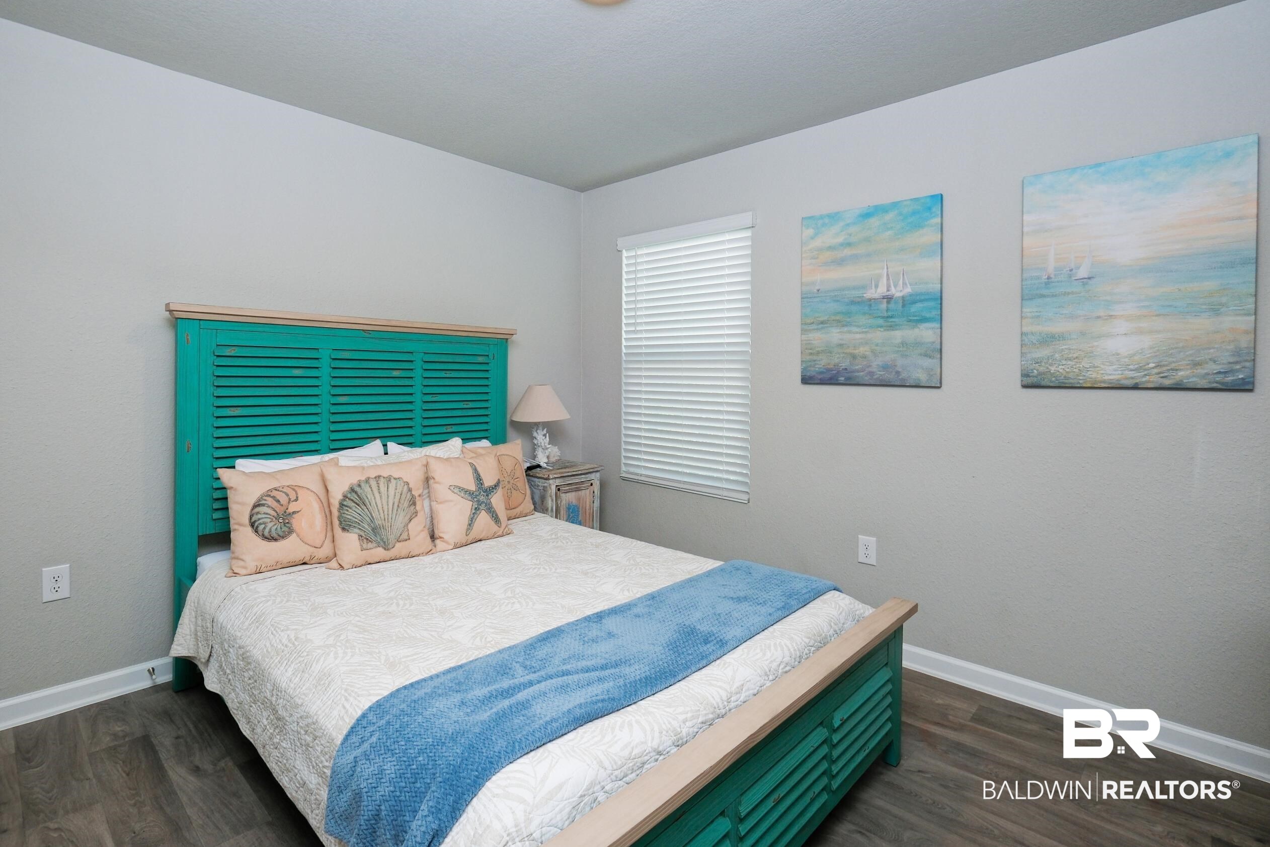 7425 Coppin Drive Foley, AL 36535 - Photo 33 of 41 Bedroom featuring dark hardwood / wood-style flooring