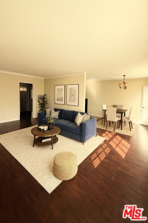 1242 Smithwood Drive, Unit 4 Los Angeles, CA 90035 - Photo 1 of 10 a living room with furniture and a table