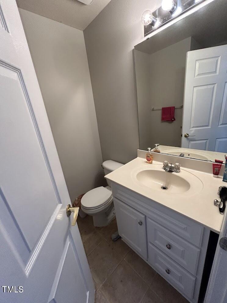 929 Morreene Road, Unit A14 Durham, NC 27705 - Photo 10 of 16 a bathroom with a sink and a mirror