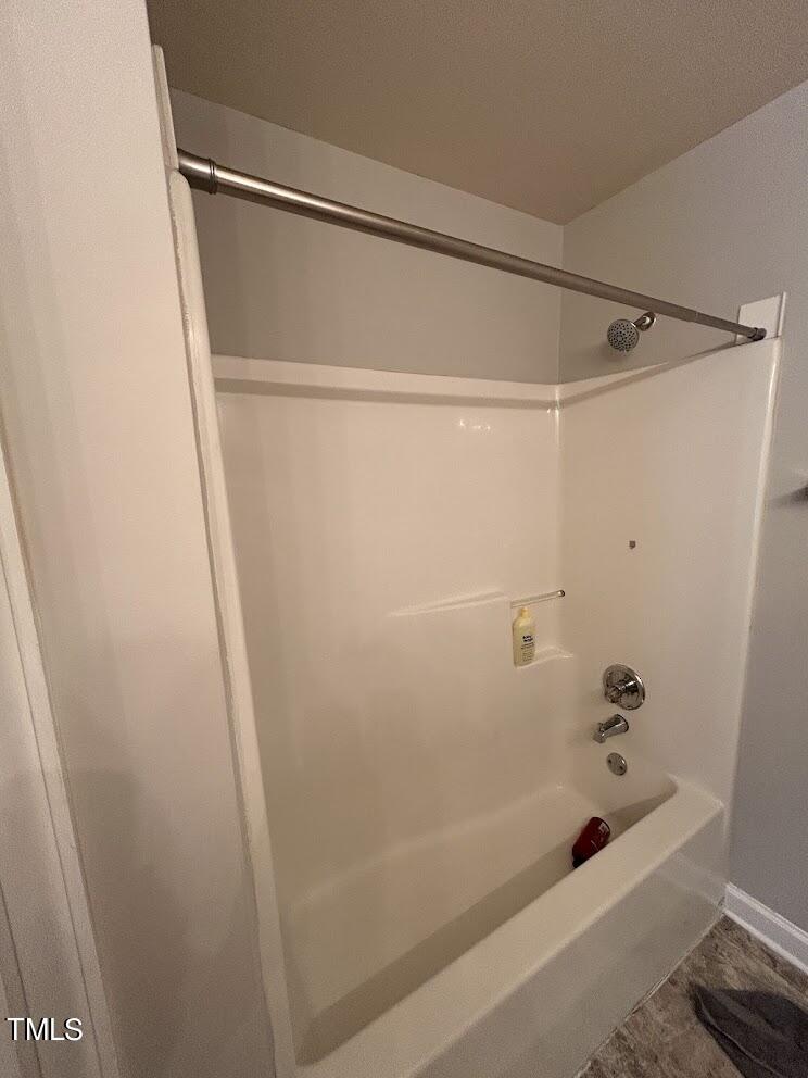 929 Morreene Road, Unit A14 Durham, NC 27705 - Photo 7 of 16 a bathroom with a shower and a bath tub