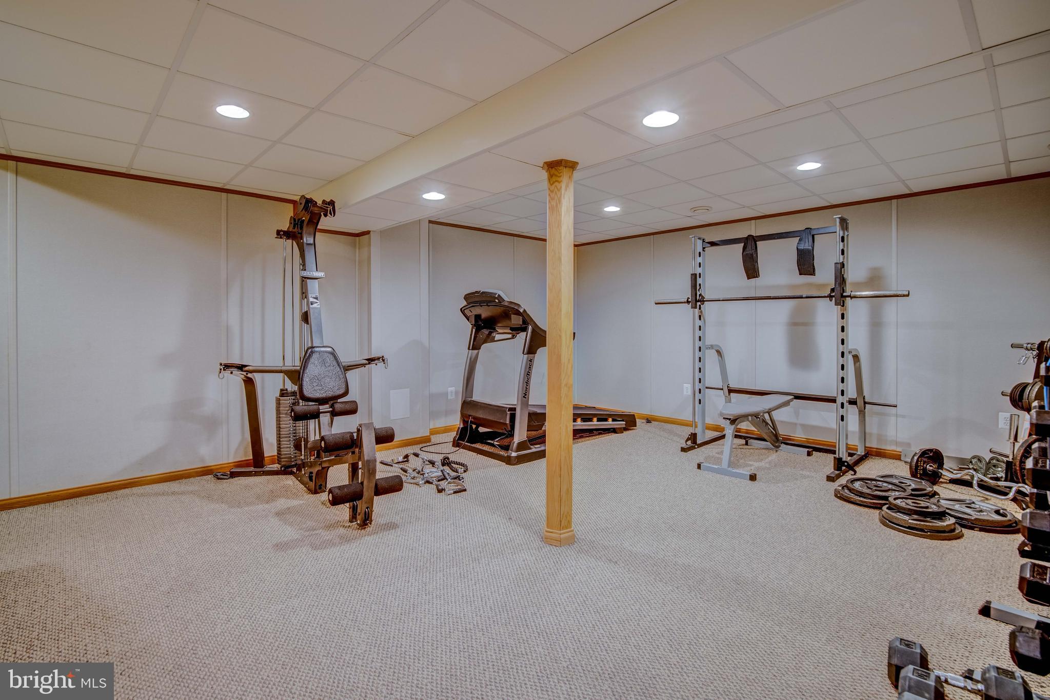 11431 Rawhide Road Lusby, MD 20657 - Photo 27 of 31 a view of a room with gym equipment